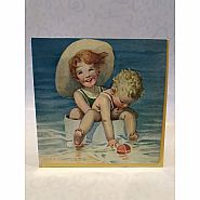 T.J. Whitneys Card: Children in Bucket at Beach